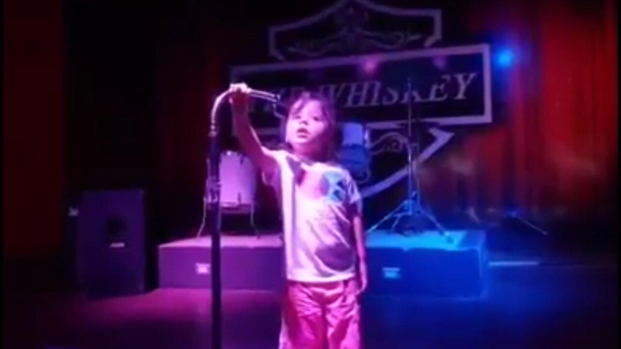 Bella at 3 years old- at The Whiskey in Costa Rica - rocking out to Bon Jovi