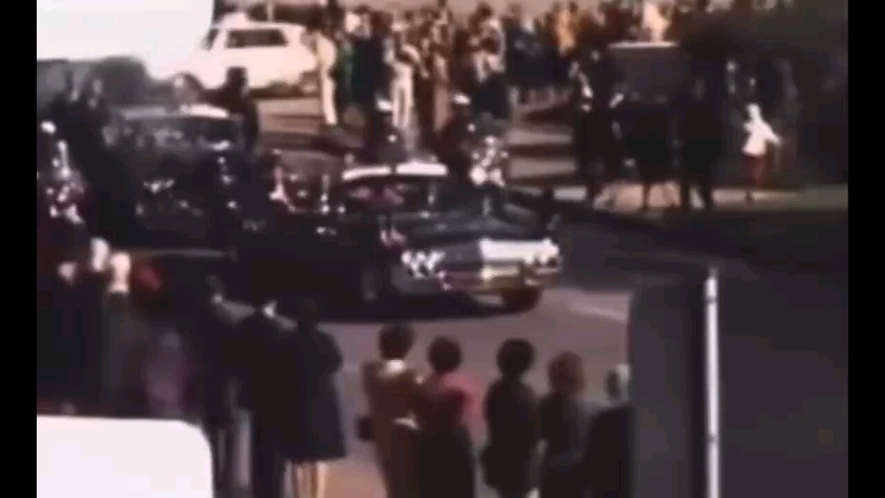 Watch Kennedy get shot and hunch over, then the driver turns and shoots him in the head!