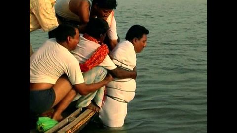 Man Swims With Arms Tied