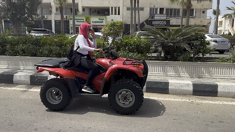 My aunt riding beach buggy with me in Alexandria