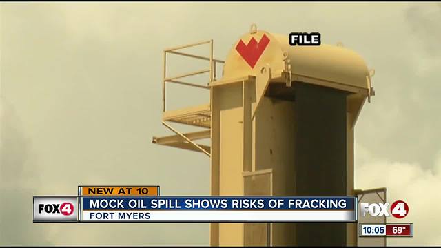 Group puts on mock oil spill to protest fracking