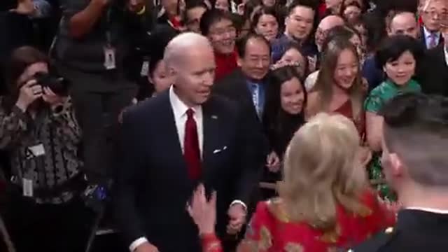 Jill Biden gets in the way and ushers Joe along before he answers.