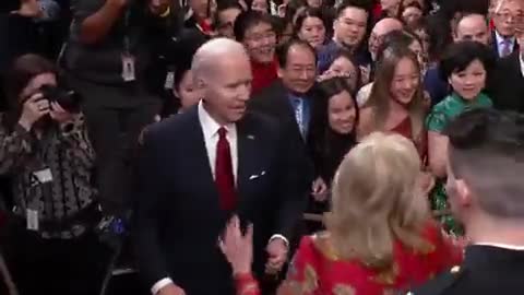 Jill Biden gets in the way and ushers Joe along before he answers.