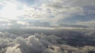 DREAM 49 FLYING THROUGH CLOUDS
