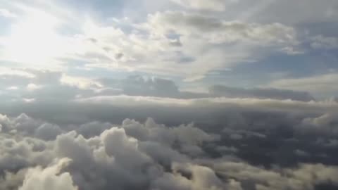 DREAM 49 FLYING THROUGH CLOUDS