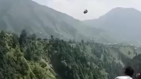 Dramatic moment rescuers attempt to save children stuck in cable car.