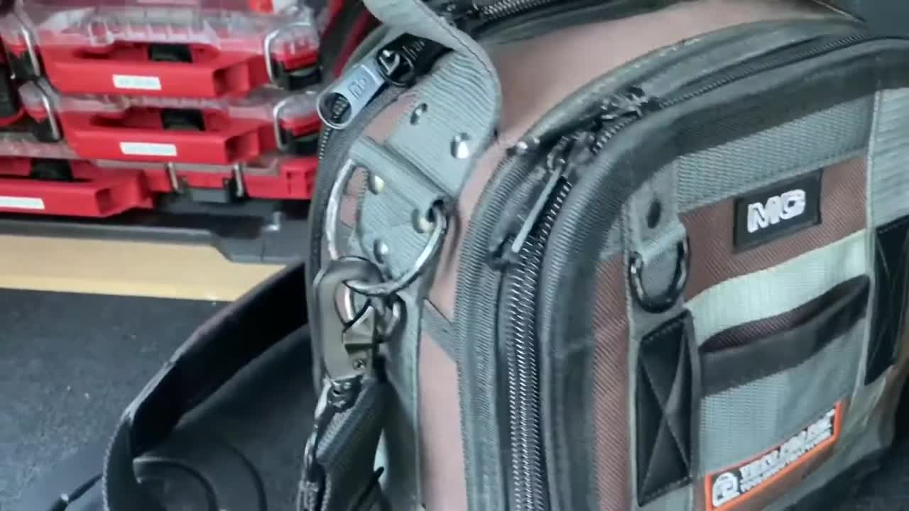 Mounting Milwaukee packout and veto bag in a car with Velcro