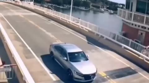 Car crash bridge. Weird moment caught on camera