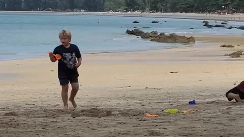 LIVING THEIR BEST LIVES - spending the morning at the idyllic Klong Dao beach at low tide