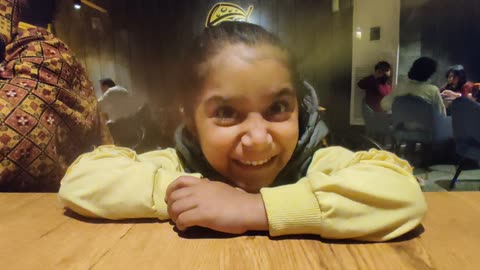 Kids Playing on eating table