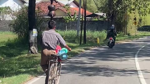 Bike Rider's One-Sided Balancing Act