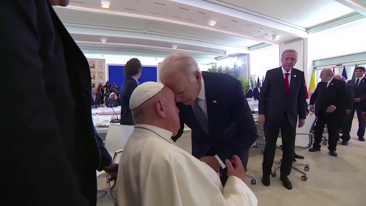 Biden head bumps surprised-looking Pope Francis at G7 summit