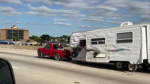 Small Truck Tows Long Trailer