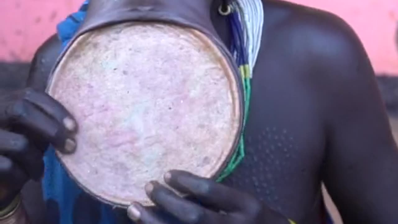 A woman from the Surma tribe puts in her lip plate #afric...