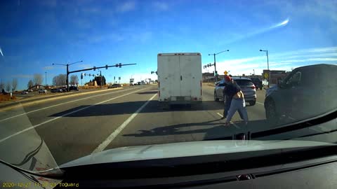 Drivers Fight in the Middle of the Street