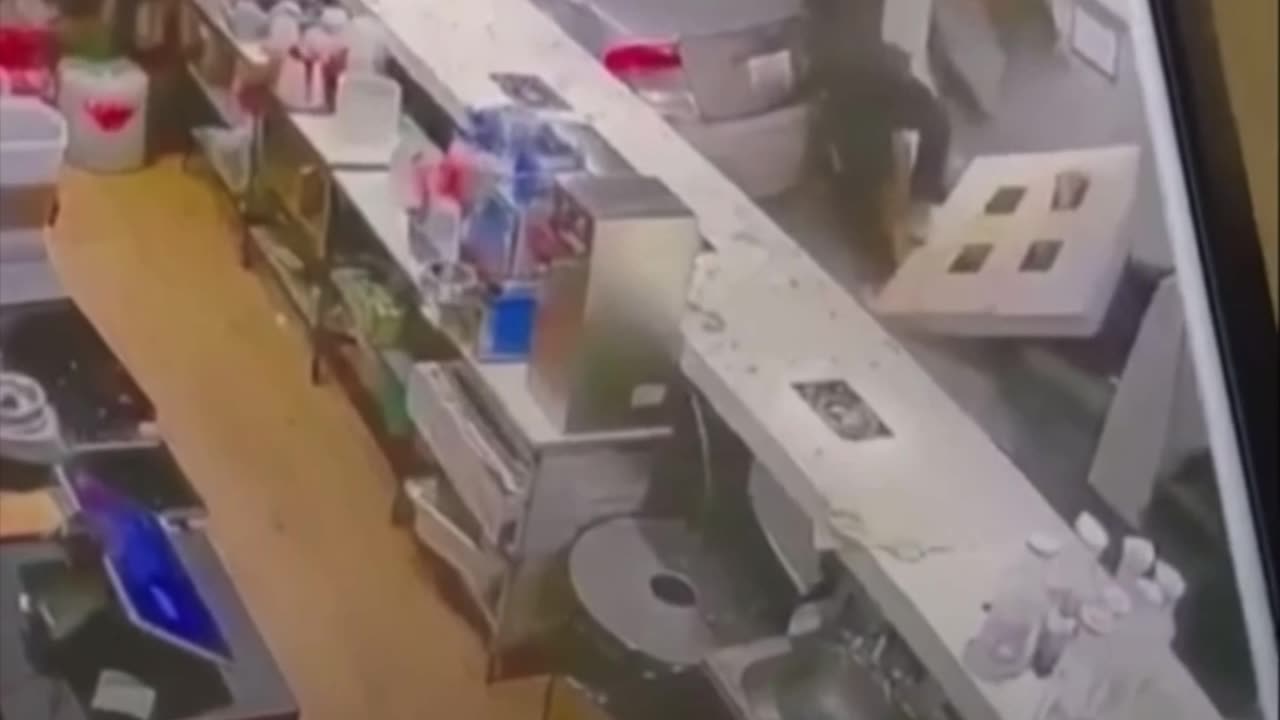 Dramatic moment car crashes into restaurant