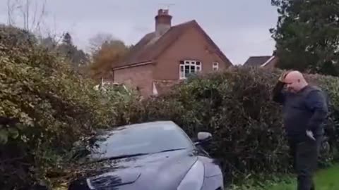 Man Accidentally Parks In Some Bushes; The Person Recording Drives By And Makes Fun Of Him