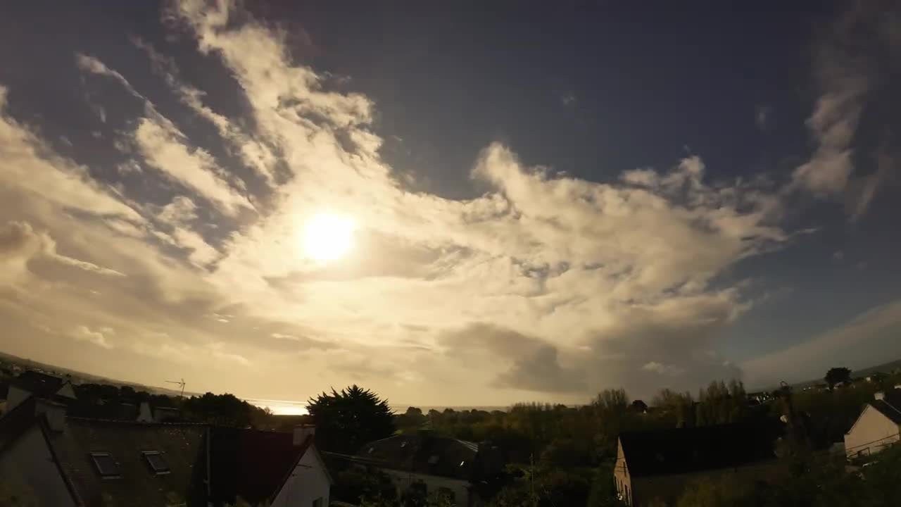 Scrolling clouds at the end of the day on the Brittany coast