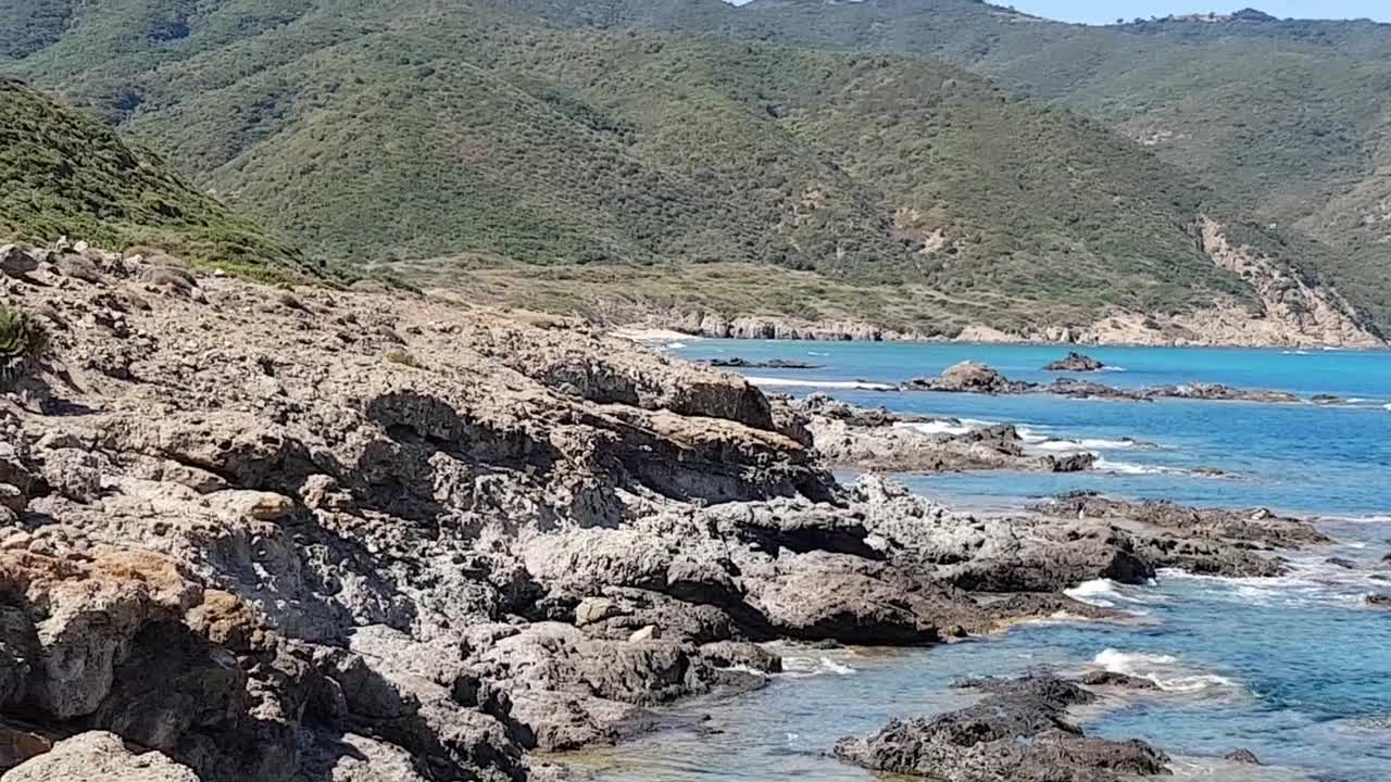 Beautiful shot of the sea and mountain confluence.