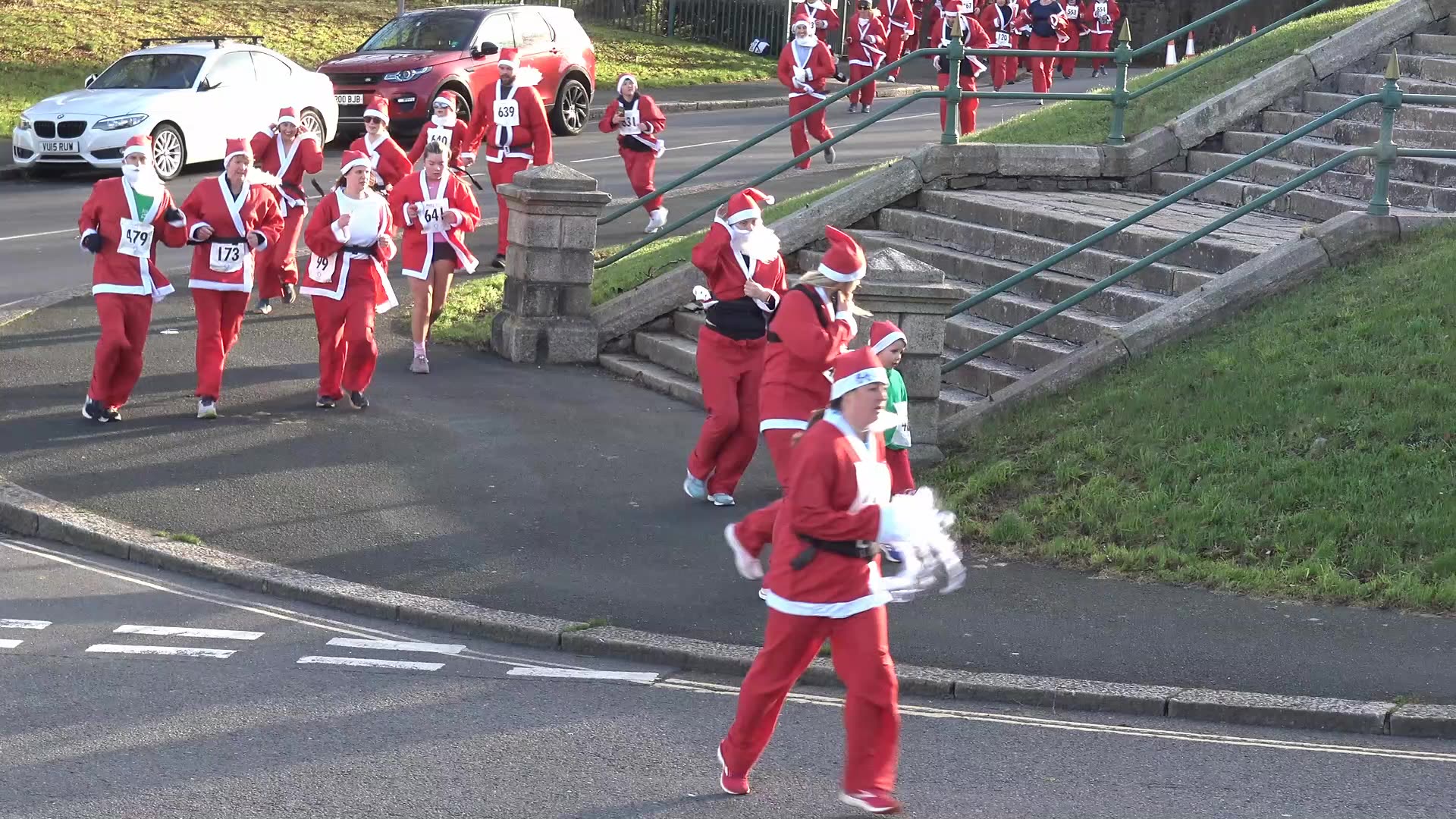 Plymouth Barbican Santa Fun run The South Ham singers. 8th December 2024.