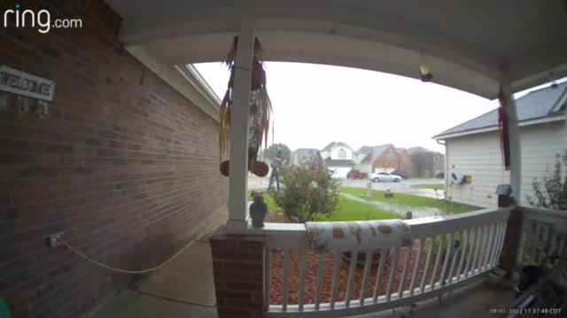 Lightning Strikes Neighbors House While Car Backs into Driveway