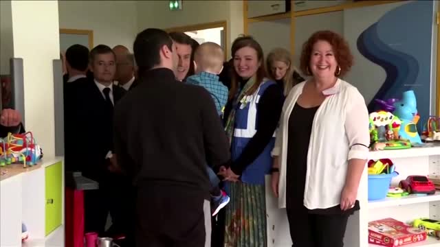 Macron visits mothers, children who fled Ukraine