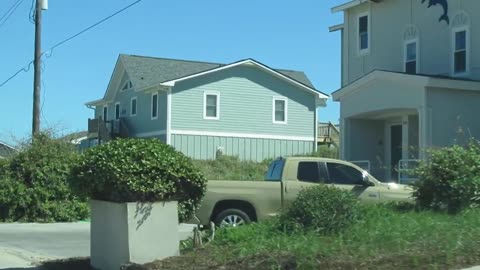 Driving along Ocean Drive in Emerald Isle, NC