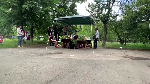 Family bury twins killed in Russian missile strike