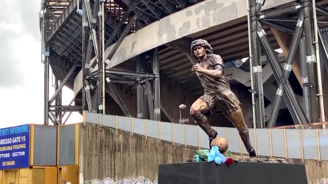 Naples unveils Maradona anniversary statue