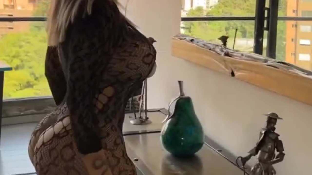 Big around Ass in that black fishnet dress.😋