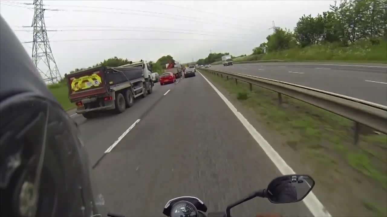 Truck Swerves to Avoid Hitting a Car Changing Lanes