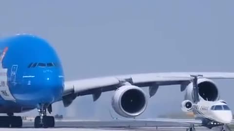 Big Plane About to Swallow Small Plane #deceivinglooks #aviation #hugemachine