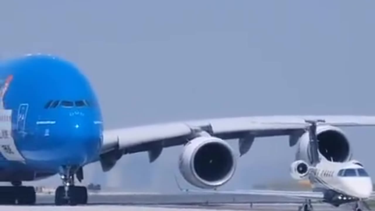 Big Plane About to Swallow Small Plane #deceivinglooks #aviation #hugemachine