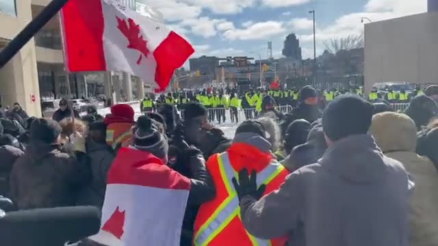 Police pushing against protestors