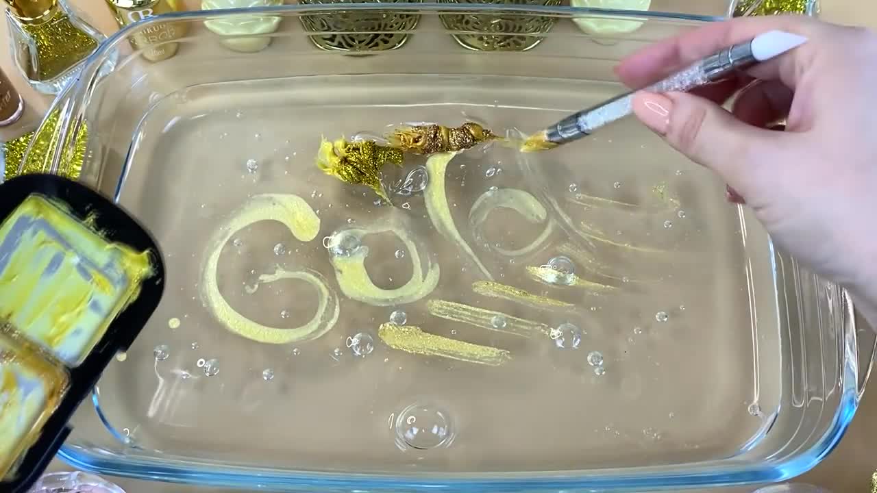 GOLD SLIME | Mixing makeup and glitter into Clear Slime | Satisfying Slime Videos