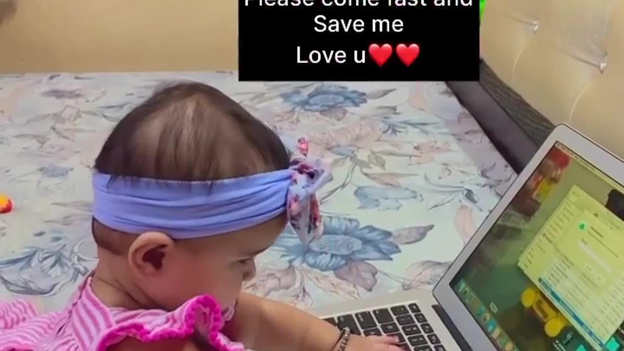 Baby play with laptop