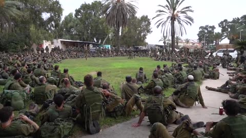 Israeli reservists preparing to storm the Gaza Strip.