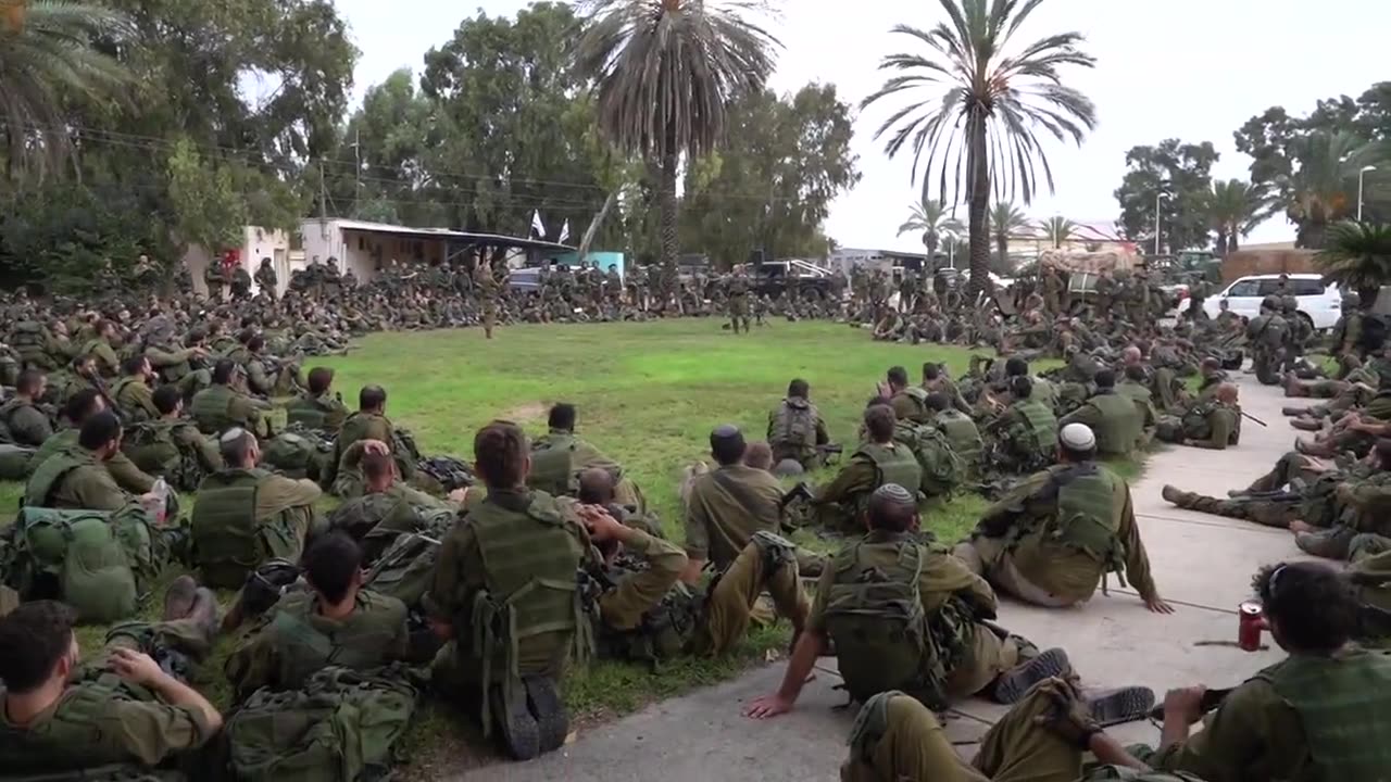 Israeli reservists preparing to storm the Gaza Strip.