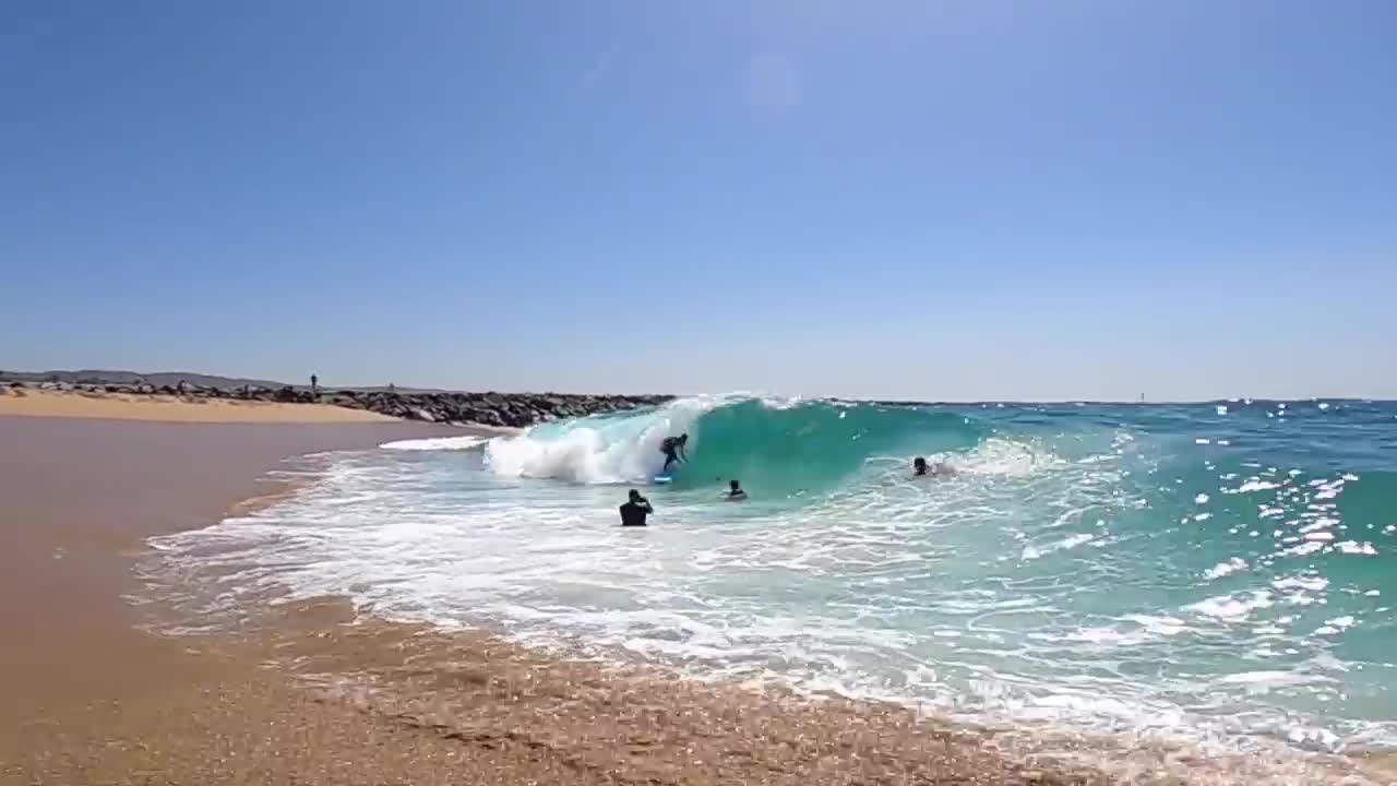 Surfing and Skimboarding WEDGE on massive HIGH TIDE