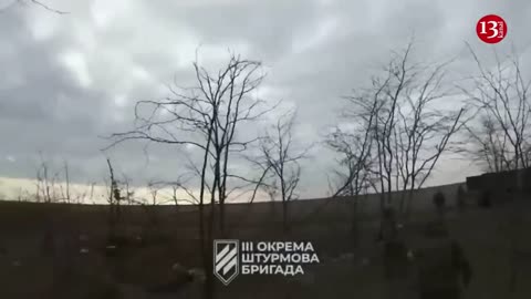 Ukrainian fighters gather to vehicles ammunition that Russians abandoned around Bakhmut