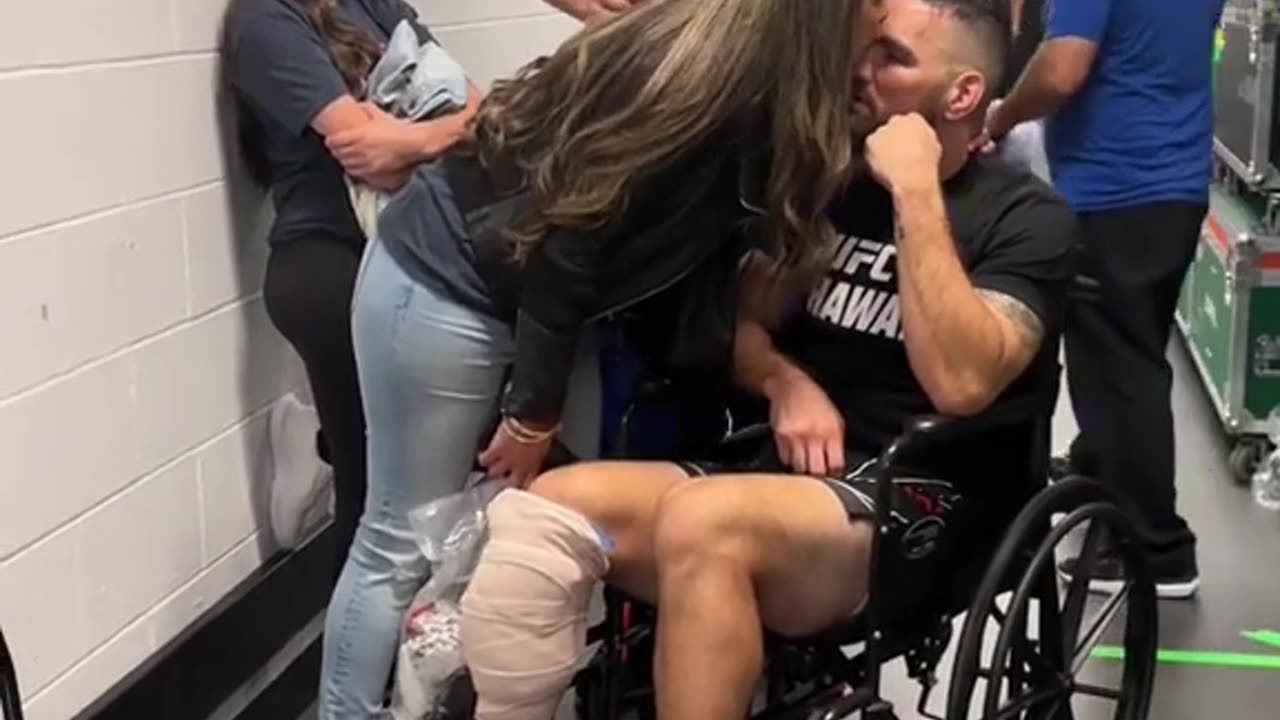 Weidman embraces his family after #UFC292 ❤️.