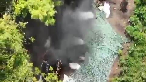 Russian Soldier Trying to Shoot Down Ukrainian Drone Catches Grenade Instead