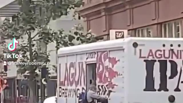 Guy Stealing Bear From A Delivery Truck In Dumpster Fire San Francisco