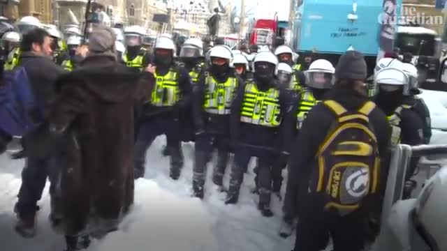 Police pushed back protesters in Canada’s besieged capital on Saturday, arresting 170