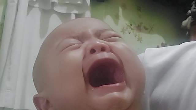 CHILD CRYING BECAUSE OF HIS SISTER