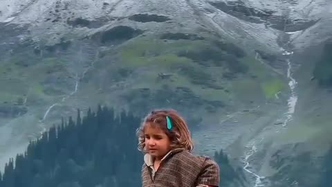 Enchanting Moments: ❤️❤️A Beautiful Baby Girl Amidst the Green Mountains ❤️❤️