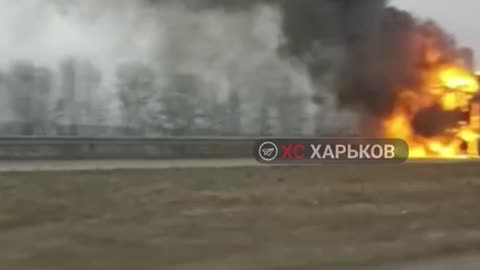 Burning truck on the highway in Kharkiv