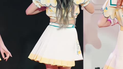 cute little girl dancing on stage with beautiful dress
