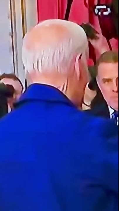 Biden is wearing a mask. What is going on. Is this a fake Biden