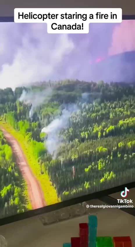 Helicopter Starting Forest Fires In Canada
